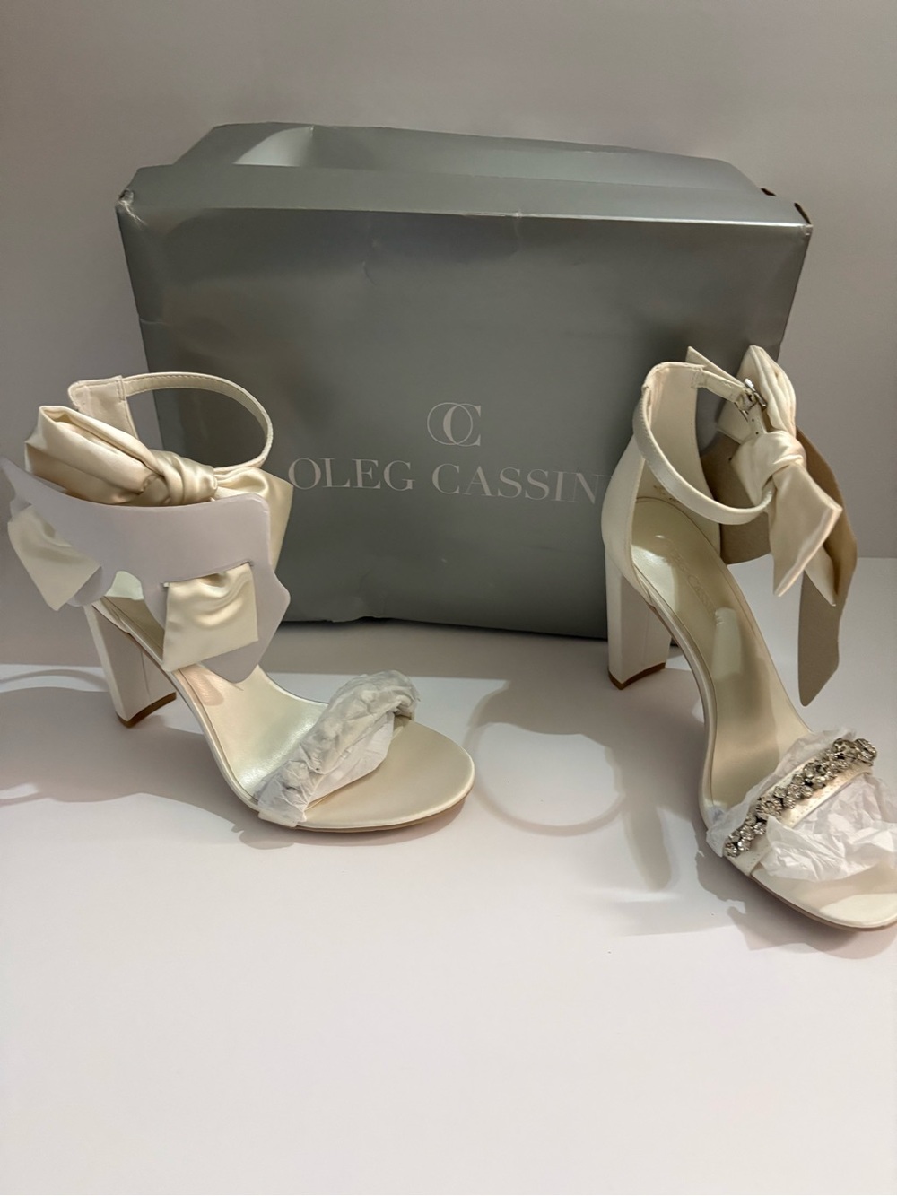Oleg Cassini Ivory Satin Block Heel Sandals with Bow and Jeweled Strap